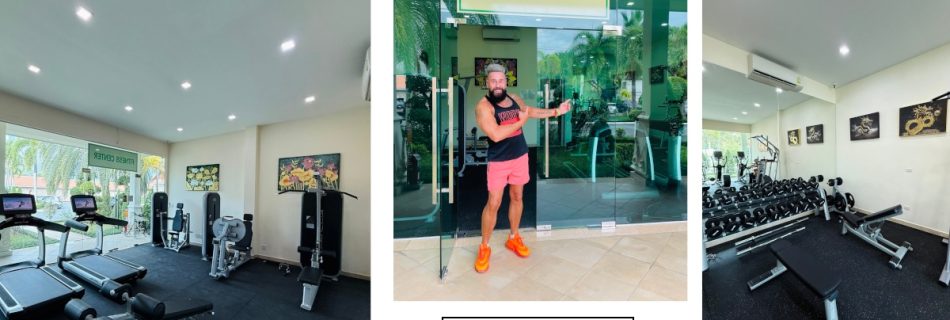 Modern fitness gym at Thai Garden Resort, Pattaya featuring treadmills, crosstrainers, air bike, free weights, and workout machines.