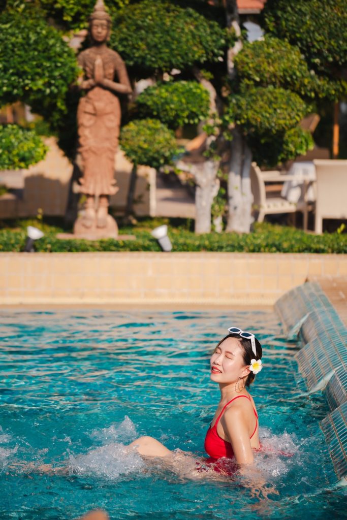 Woman relaxing in the jacuzzi at Thai Garden Resort Pattaya’s pool