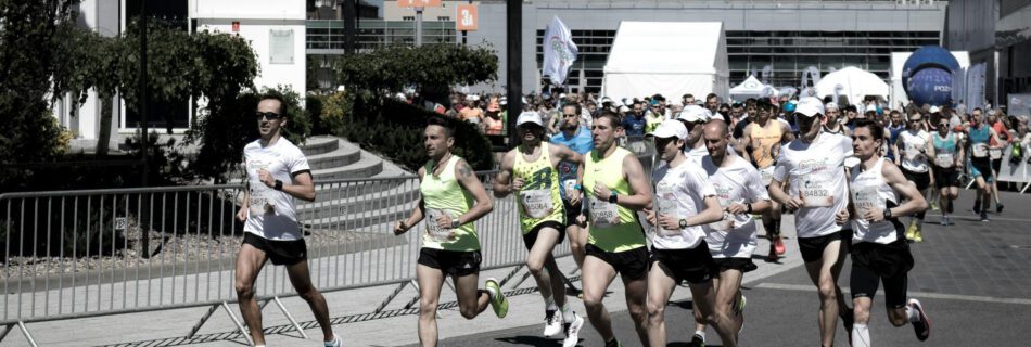 Runners participating in the Pattaya Marathon 2025, showing diverse athletes running on the race course.